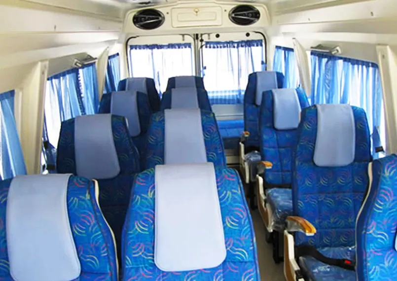 Passenger seating inside a Tempo Traveller