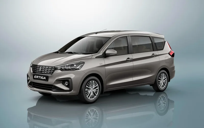 Ertiga cab with family-friendly seating for a pilgrimage trip
