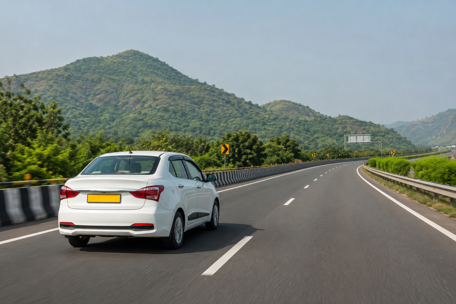 Private sedan taxi travelling on the Kalyan to Pune expressway route